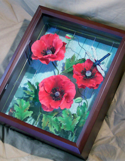 This deep shadow box was ideal, as it doubled as a showcase to display the sugar poppies and as a protectant of these delicate flowers. (8/2010)